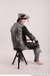 JACK PIRATE SITTING POSE WITH GUN AND DAGGER